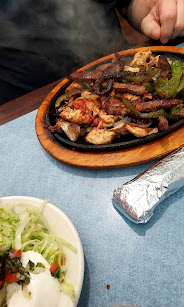 Sizzling fajitas at Referees Sports Bar